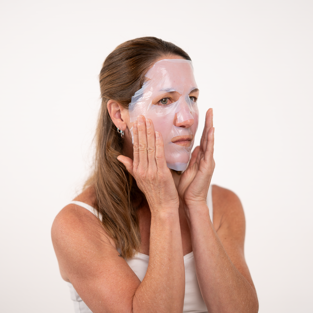 woman with la cle face mask on