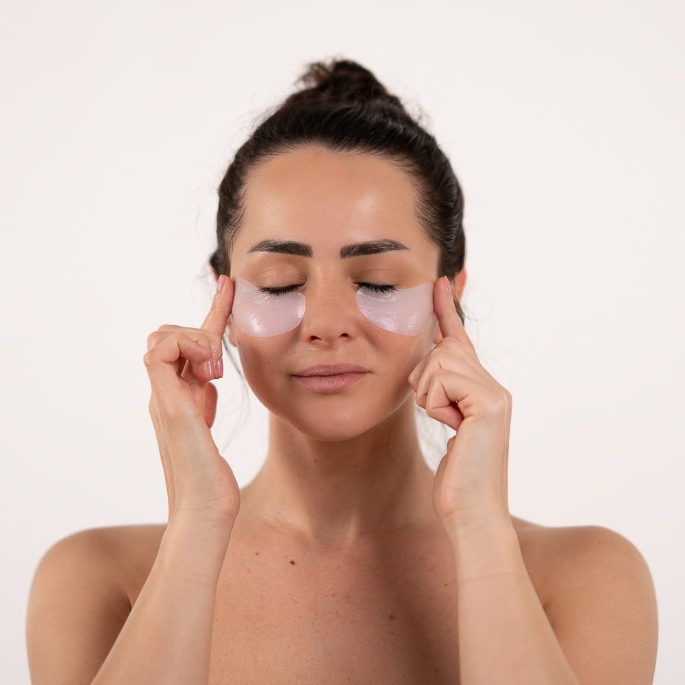 girl with la cle eye mask on her face below eyes patches